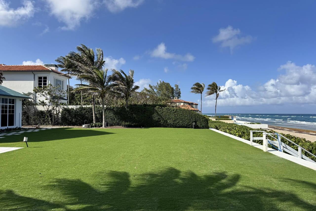 Premium oceanfront lawn maintained by Florida Boys