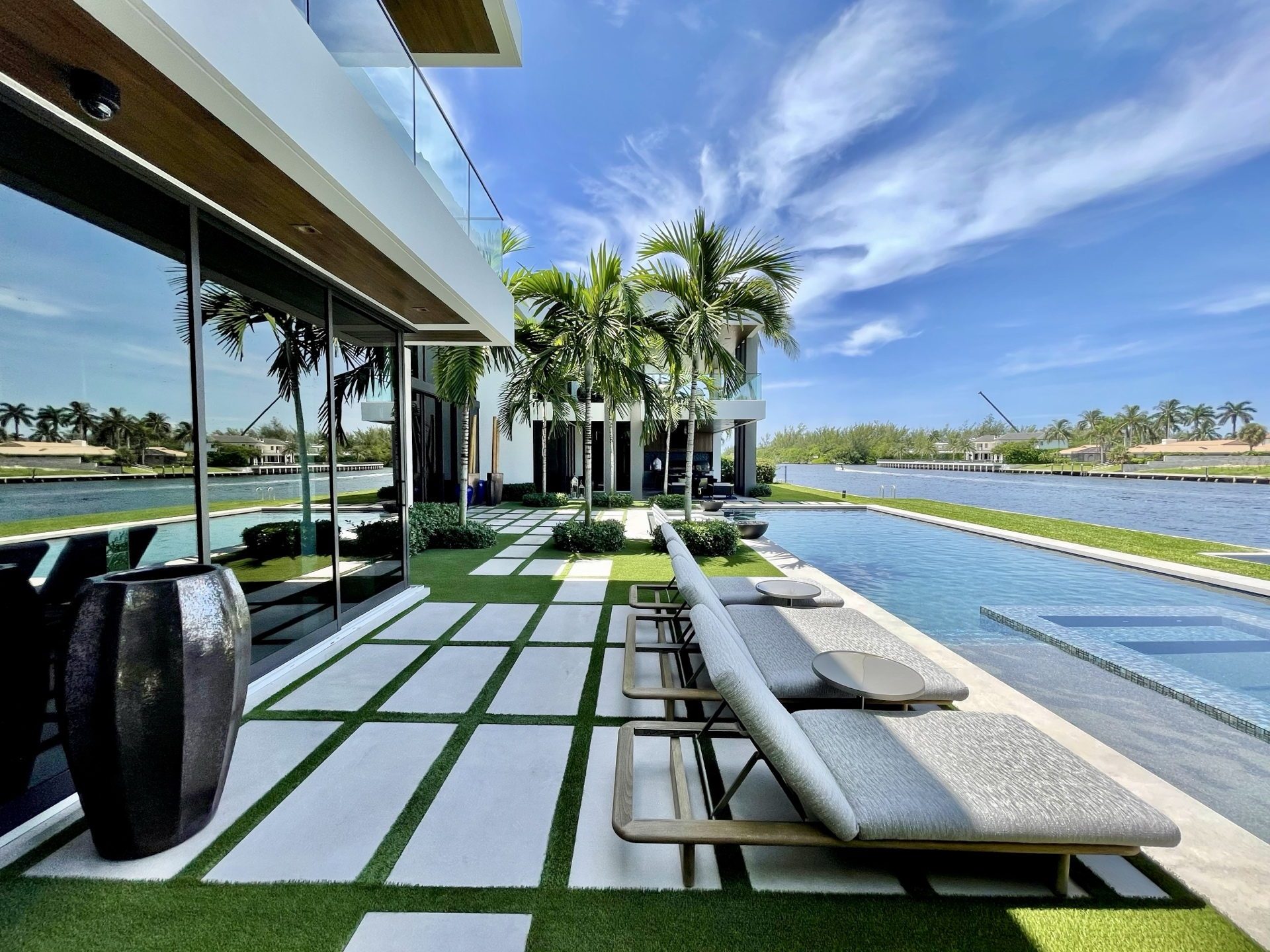 Waterfront pool deck and grounds cared for under one team